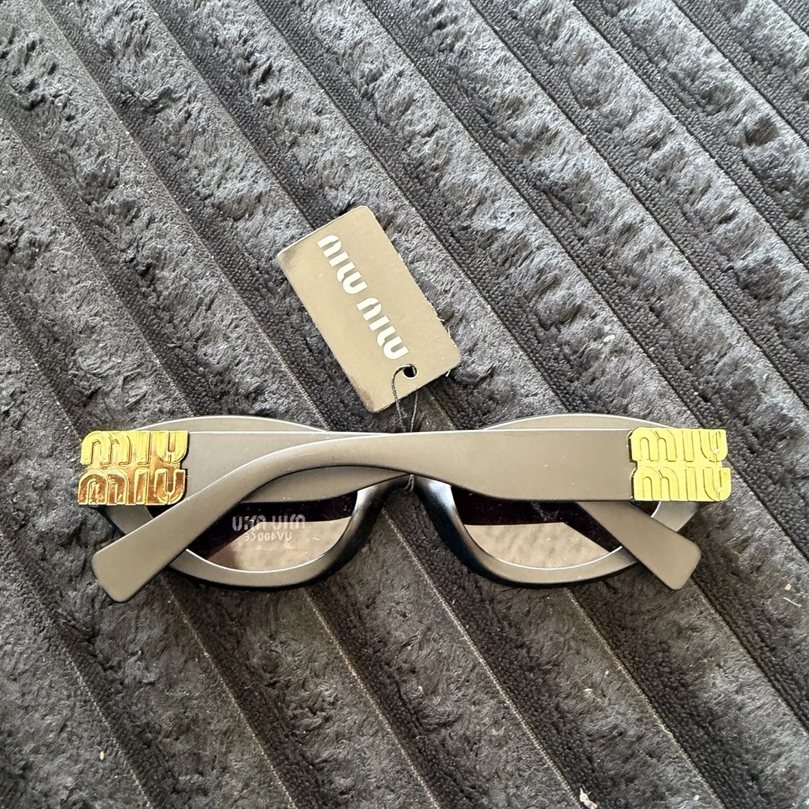 MIU MIU 立体ゴールドロゴ キャットアイサングラス MIU MIU 立体