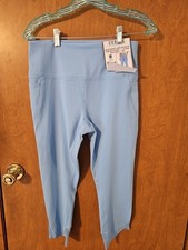RBX M Legging Capri Tulip Hem Floating Pocket Blue Wicking Squat Proof Stretch