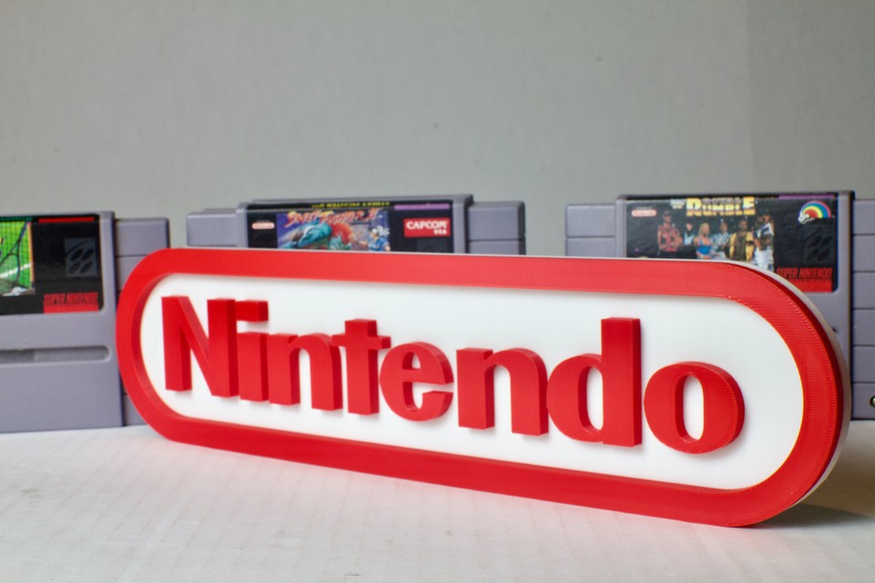 Bold Nintendo logo metal sign that turns any wall into an instant gamer shrine.