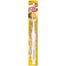 Premium care toothbrush 6 rows regular firm