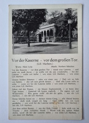 Postcard - photo / song card - Lili Marleen in front of the barracks - in front of the big gate - 1942