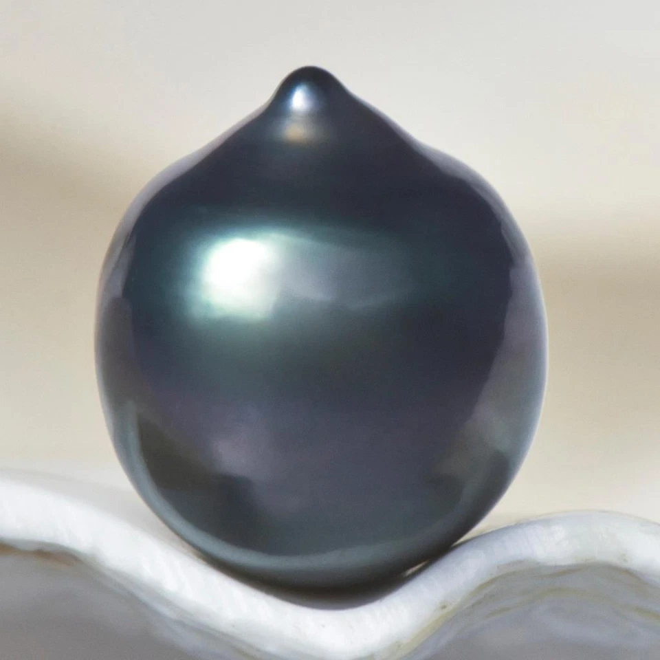 12.20cts Tahitian South Sea Pearl 13.87mm Charcoal Black Baroque 2.44g undrilled - Image 2 of 4
