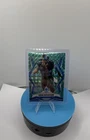 2025 Panini Phoenix Football Teal Pyramids Aidan Hutchinson #21