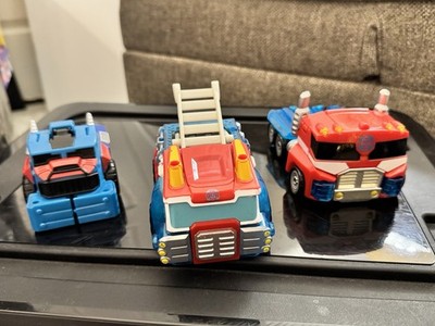 3 Transformers Rescue Bots Optimus Prime, Blue Snowplow Optimus Heatwave
