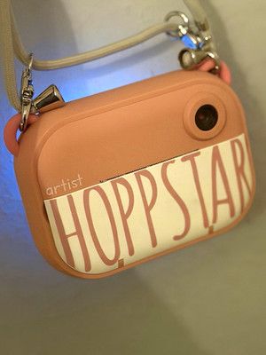 Hoppstar Artist Kinder-Digitalkamera Kompaktkamera rosa/weiß mit Umhängeband