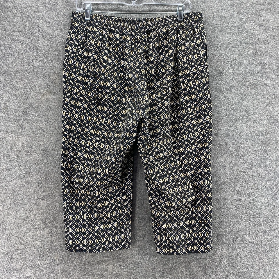 Pantalones cortos Alfred Dunner para mujer 12P Petite negros geométricos tiro alto frente plano Foto 2 de 4