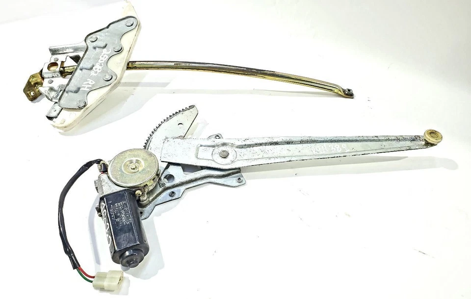 Regulador de ventana derecha Conquest Chrysler 1985 1989 fabricante de equipos originales con rodillo de poste guía Foto 3 de 4