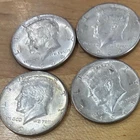 4 1964 Kennedy Silver Half Dollars