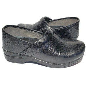 dansko embossed clogs