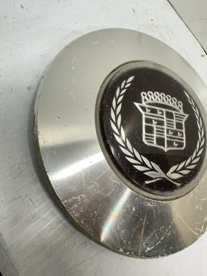 1989-1991 Cadillac Seville Machined With Dark Red center wheel center cap OEM - Image 2 of 4