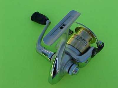 DAIWA SWEEPFIRE 2000B SPINNING REEL, NEW IN THE BOX L@@K HIGH