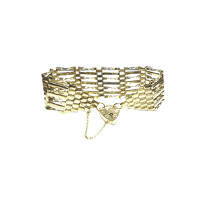 9ct gold 7 Bar Gate Bracelet. 9ct gold 7 Bar Gate Bracelet.