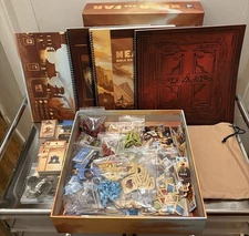 Near and Far Kickstarter Deluxe Edition With 50 Metal Coins Cards Are Sealed