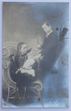 Young Girl Seated in Ornate Chair with Doll & Brother at Side Postcard RPPC 3173