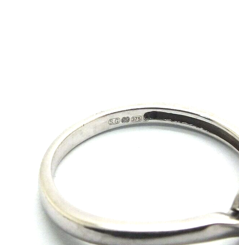 Ladies 9ct white gold twist design ring set with a solitaire diamond, UK size J - Picture 7 of 9
