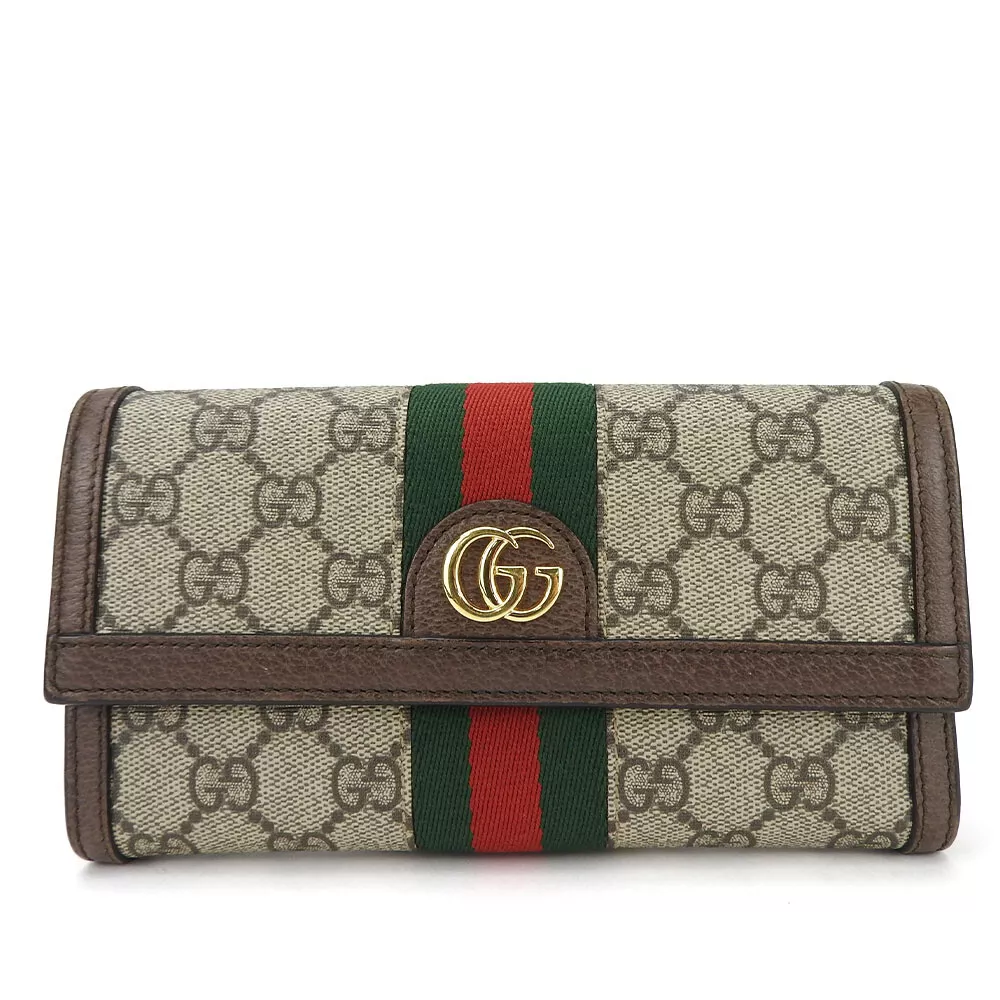 Sac à main GUCCI D'OCCASION 523153 cerf off GG toile suprême/cuir beige bifol...