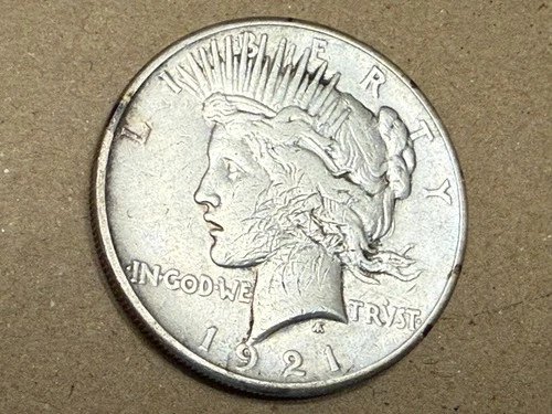 1921 high relief PEACE U.S. silver dollar. Cleaned VF, lots of small marks. #kd5