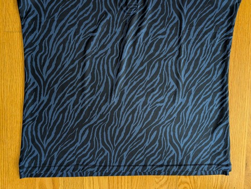 Camisa polo de golf G/FORE para mujer grande con estampado de animales sin mangas rendimiento - Imagen 2 de 9