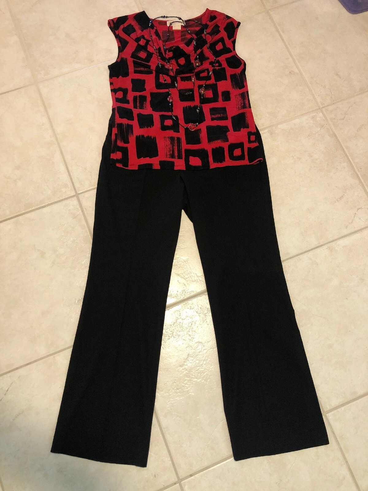 Completo donna Michael Kors: top PL; pantaloni 12S. Collana. Us intime ottimeioni!