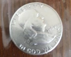 1950-P Franklin Half Dollar, AU, with mint error
