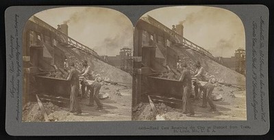 Hand cars receiving the clay as dumped by train, St. Louis, Mo., U.S.A.