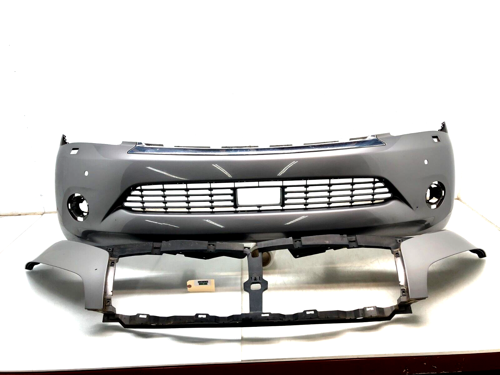 20112013 INFINITI QX56 FRONT BUMPER COVER ASSEMBLY W/ UPPER TRIM OEM