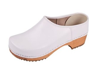 white wooden clogs