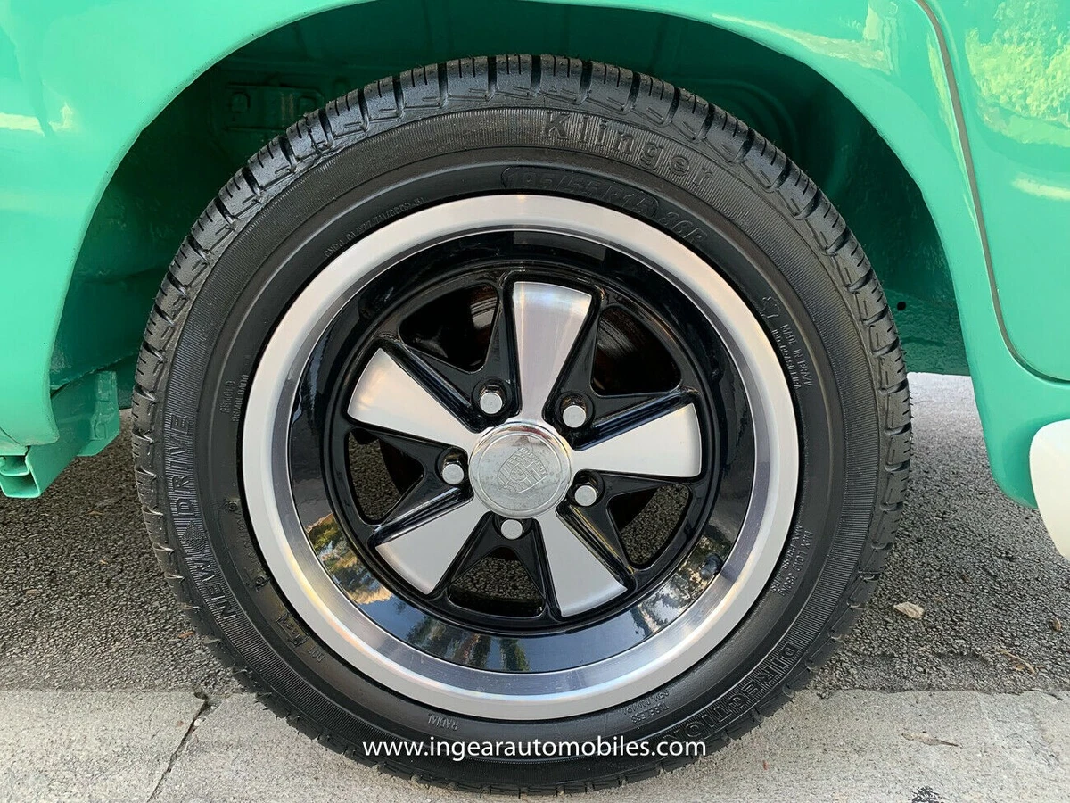 Porsche Wheels make this Vanagon Camper stand out.
