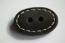 Knöpfe Jim Knopf 2-Loch oval Leder schwarz 