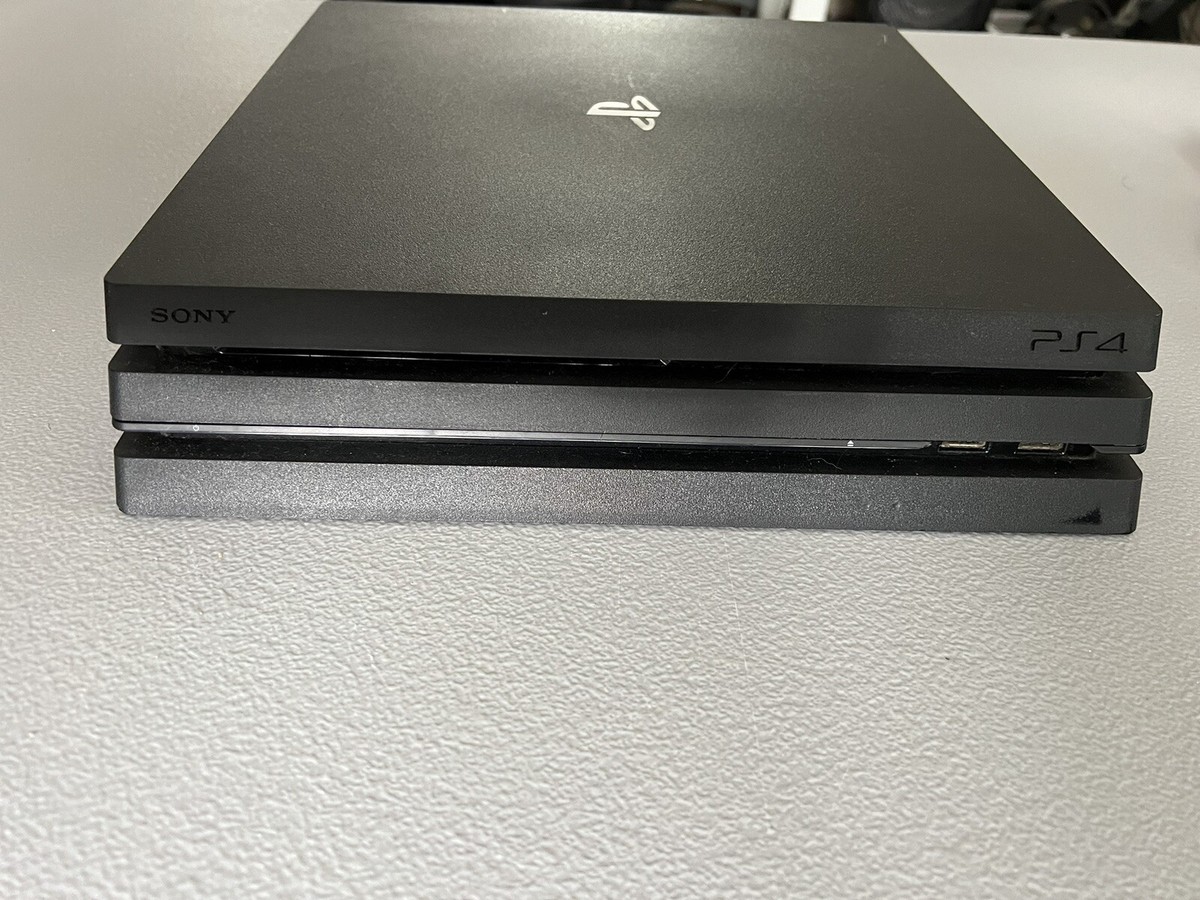 Sony PlayStation 4 Pro 1TB Console w/ Dual Shock Controller