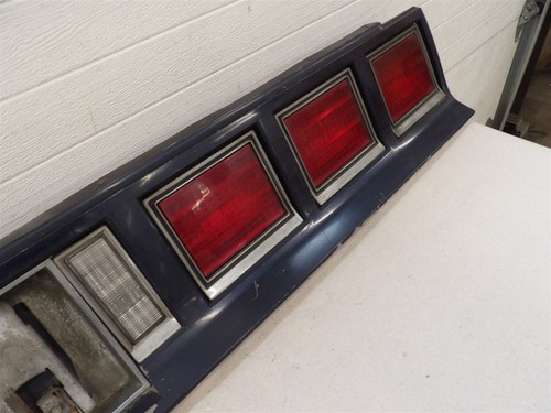 1980-1985 CHEVY IMPALA TAILLIGHT TAIL FINISHING PANEL WITH LICENSE GAS DOOR - Picture 7 of 11