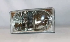 TYC 20-6439-00 Headlight Assembly 2001 - 2004 Ford Excursion Passenger Side  NEW