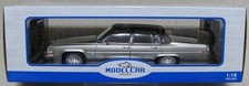 MCG 1/18  Cadillac Fleetwood Brougham metdarkgrey 1982 937147