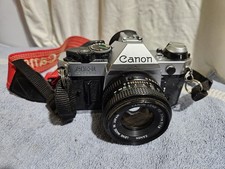 Canon AE-1 Progam 35mm Film SLR Camera with Canon FD 50mm f/1.8 Lens
