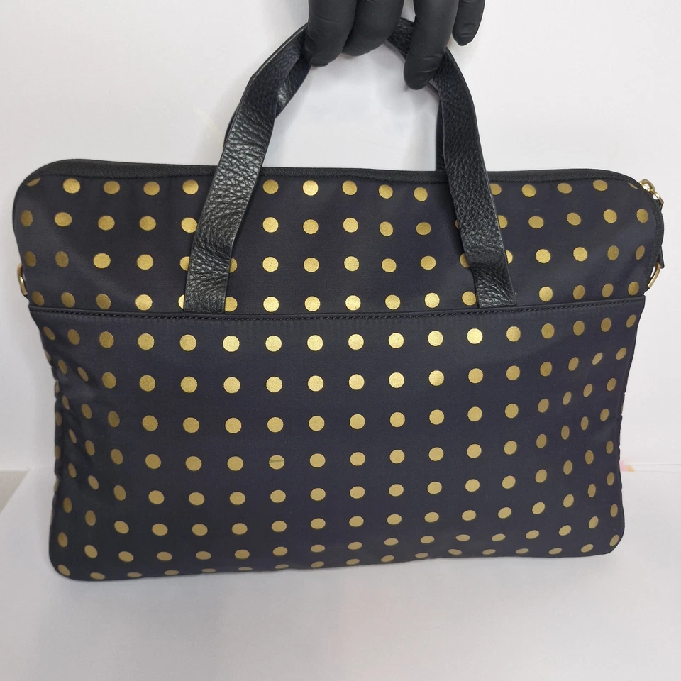 Bolso para portátil Kate Spade a lunares patrón negro y dorado en buen estado limpio Foto 2 de 4