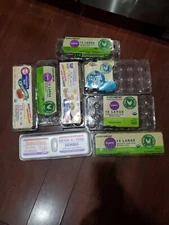 8 empty.  7 plastic 1 foam egg cartons 2 holding 24 and 5 holding 12 eggs 