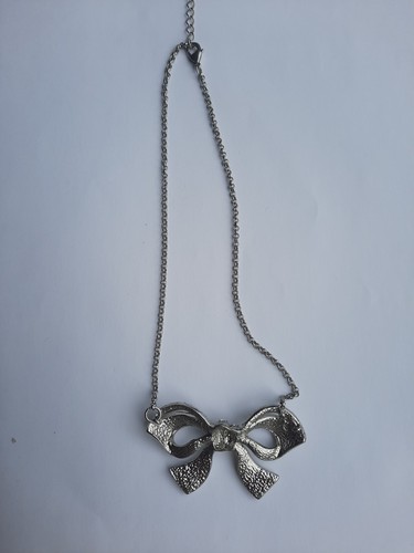 Silver Toned Clear Rhinestone Bow Necklace - Picture 5 of 12