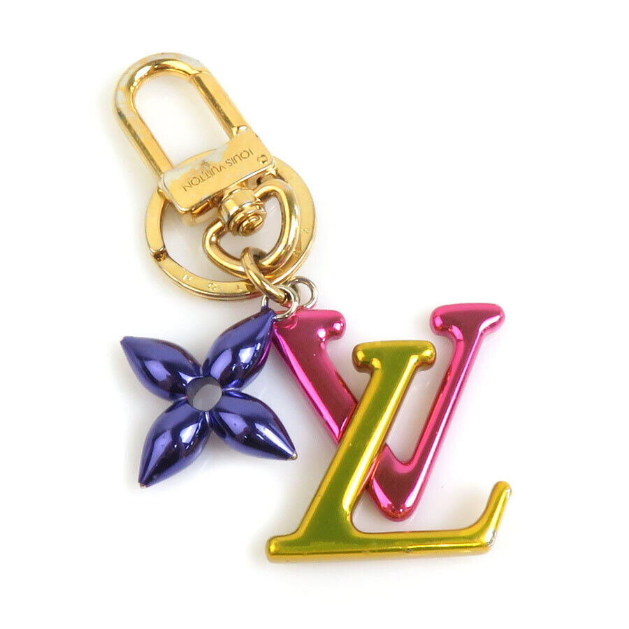 LOUIS VUITTON Porte Cles LV New Wave Bag Charm M67808 Gold LOUIS VUITTON Porte Cles LV New Wave Bag Charm M67808 Gold