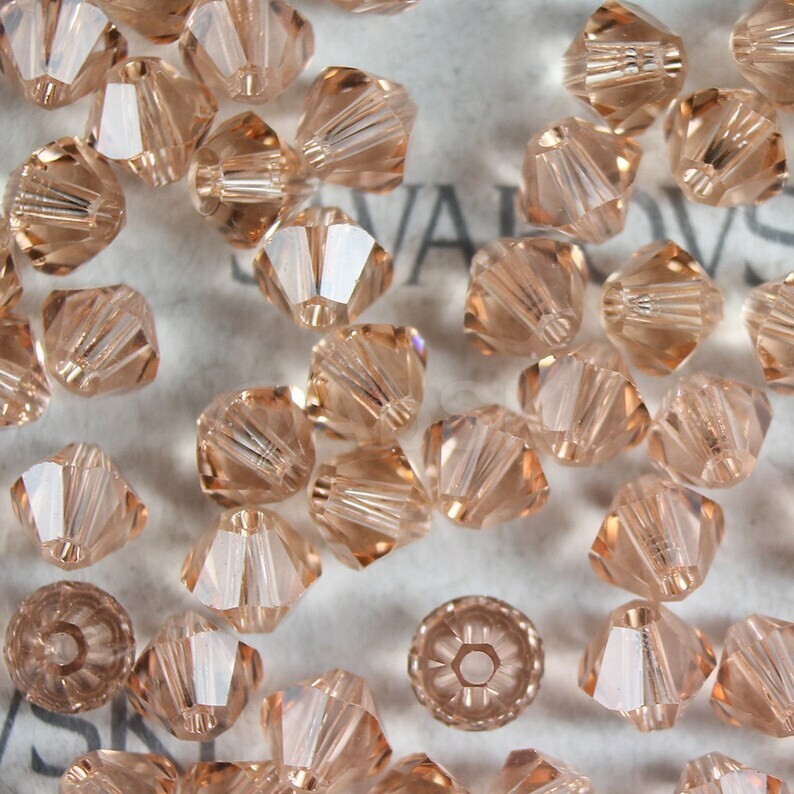 (24) 4mm Swarovski Crystal Bicones Light Peach