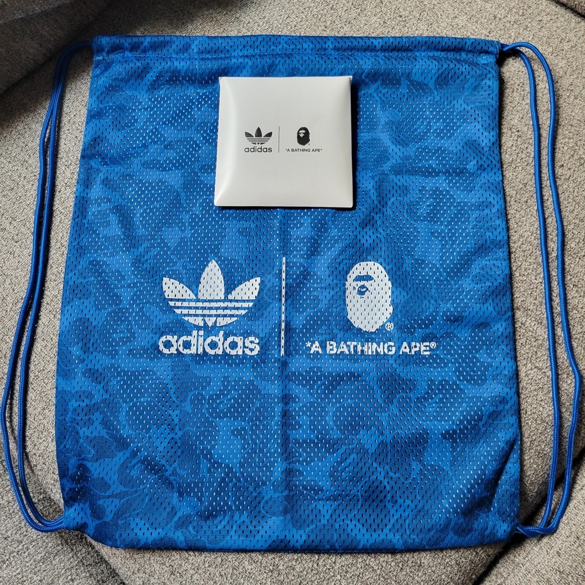 【非売品】　adidas × A BATHING APE ナップサック　バッグ 非売品】エイプ × adidas ナップサック - メルカリ