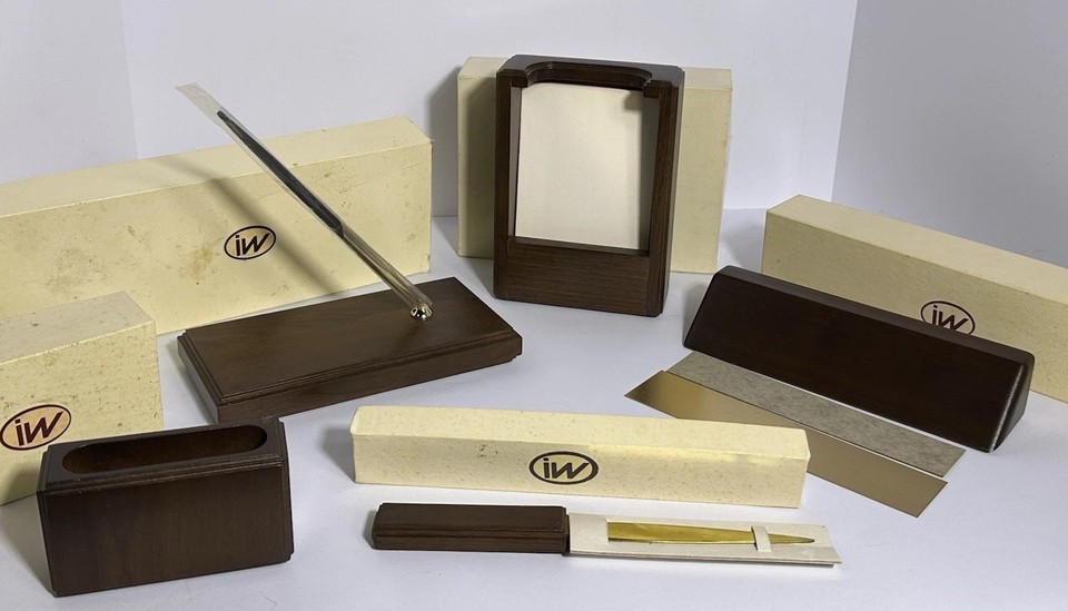 A 5-piece walnut executive desk set in original boxes — the kind of mid-century office flex that makes a home office feel like a 1960s corner suite.
