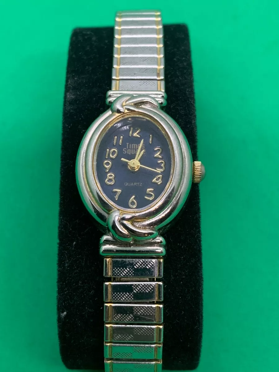 Times Square Quartz FADA Industries Inc.2 Tone Women s Stretch Band Watch
