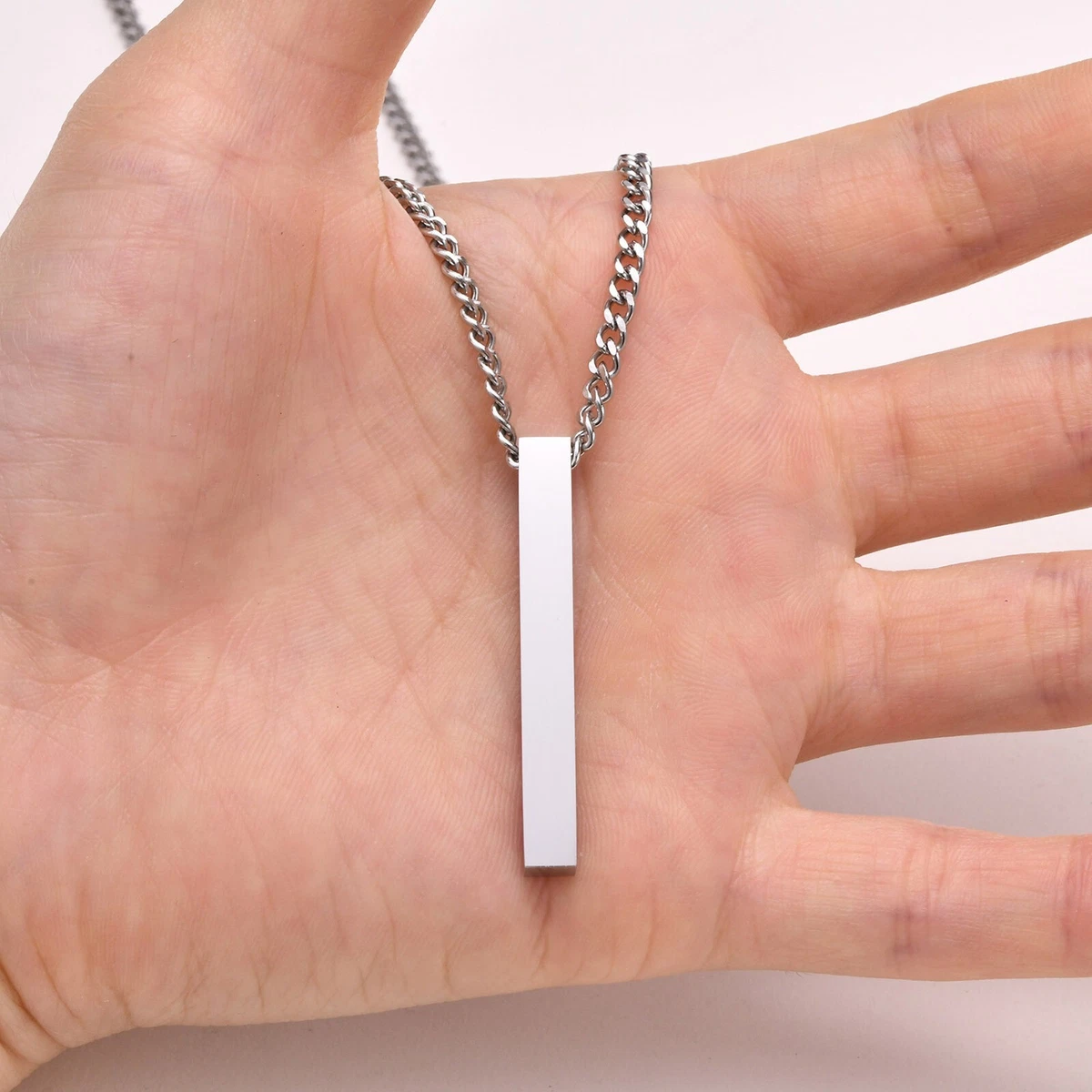Necklace with a store bar pendant