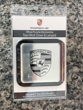 PORSCHE DESIGN FACTORY ISSUED TRAILER TOW HITCH COVER IN SILVER. NEW IN PACKAGE.