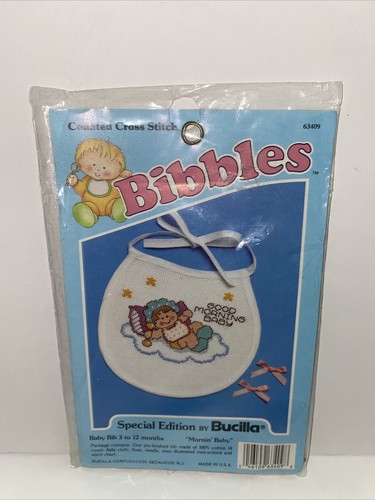 Bucilla Bibbles Counted Cross Stitch Bib Kit 63409 “Mornin’ Baby” - 第 1/9 張圖片