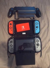 Nintendo Switch V1 (HAC-001) Console + Dock + 4 Joy-Cons + Case + Grip Bundle