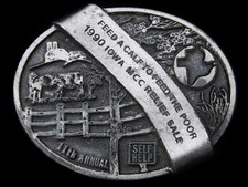LF05125 VINTAGE 1990 MCC RELIEF SALE FEED A CALF TO FEED THE POOR EVENT BUCKLE