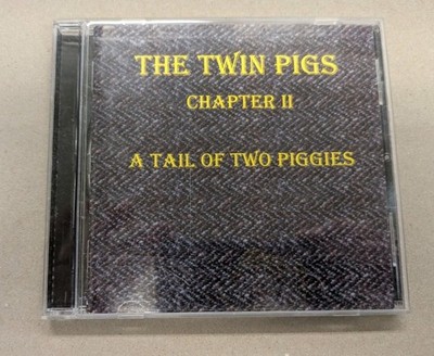 The Twin Pigs Chapter II A Tail of Two Piggies Detroit MI 2002