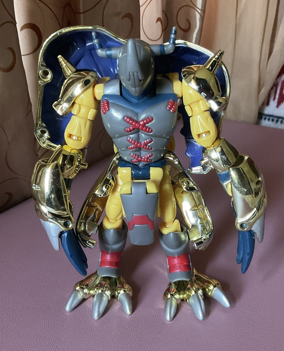 RARE Digimon Limited Edition Gold WarGreymon Agumon Digivolve