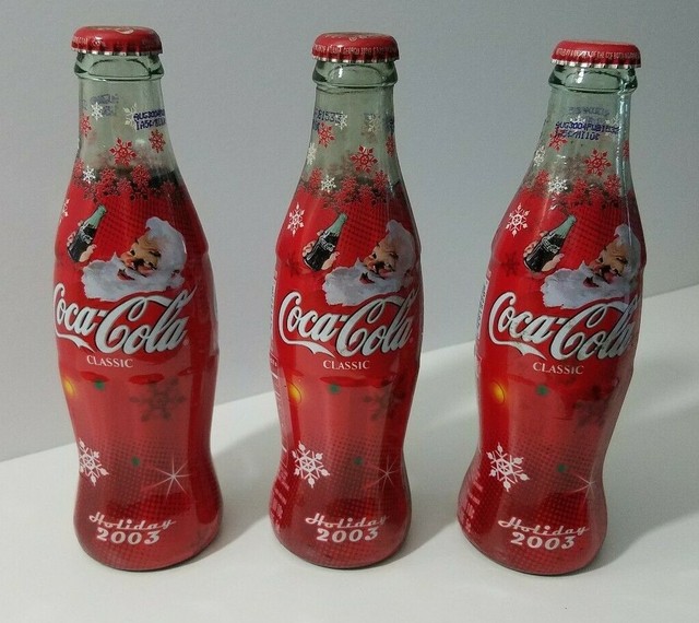 Collectible 3 CocaCola 8 0z Unopened Santa Wrapped Bottles Original